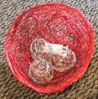 Three Stainless Steel Spheres within Red Wire Bowl by Cindy Luna <! local>